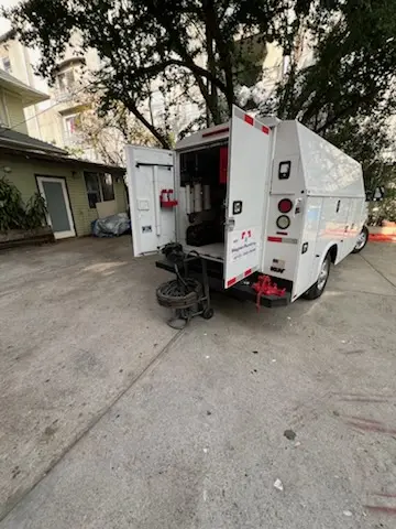 Magnet Plumbing service vehicle on-site for Grease Trap Cleaning in Biltmore Park
